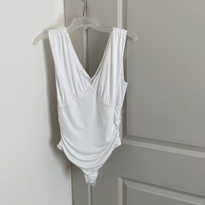 White body contouring thong bodysuit